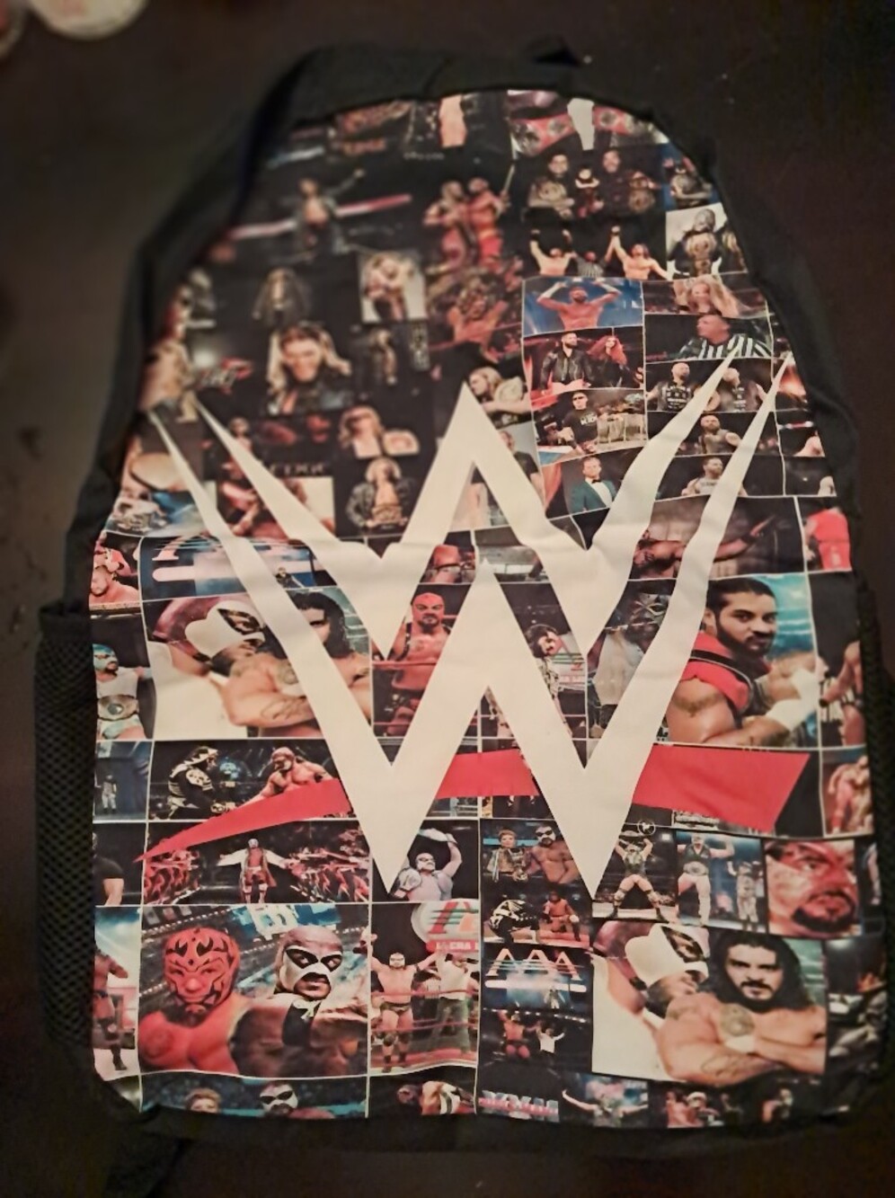 WWE Black Multi-Image Logo Kids Backpack with White W Emblem